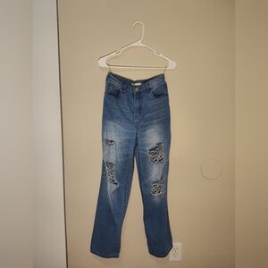 Distressed light wash high rise wide leg jeans